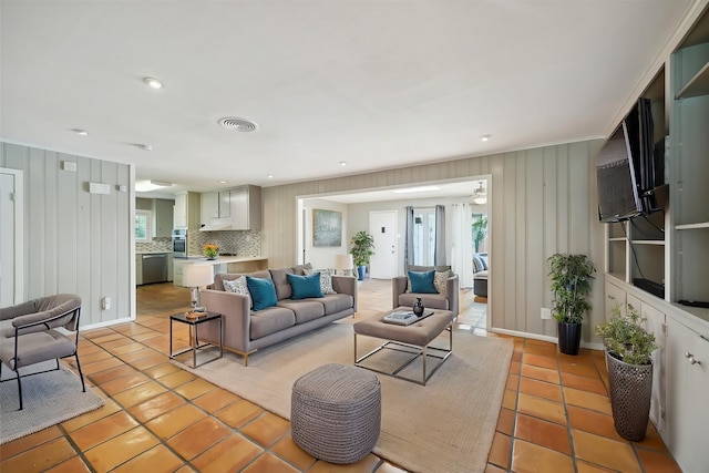 7222 Hartland Ave, Houston, TX 77055 - living area featuring light tile patterned floors and recessed lighting