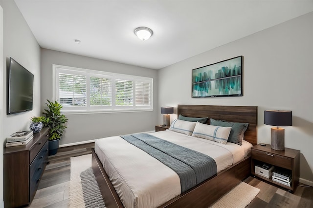 7222 Hartland Ave, Houston, TX 77055 - bedroom featuring dark wood finished floors and baseboards
