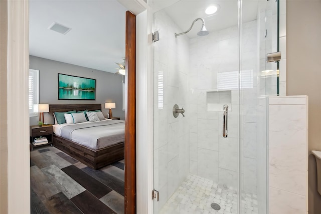 7222 Hartland Ave, Houston, TX 77055 - bathroom featuring a shower stall, connected bathroom, and a ceiling fan