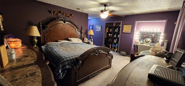 15459 Runswick Dr, Houston, TX 77062 - carpeted bedroom featuring a textured ceiling and ceiling fan