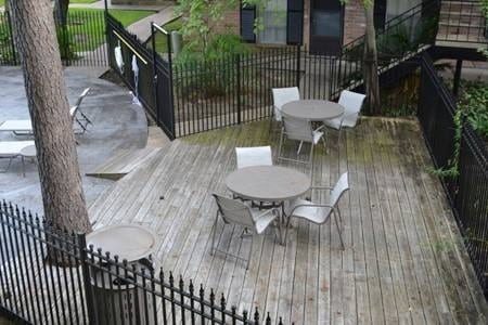 9005 Gaylord St Unit 20, Houston, TX 77024 - deck with outdoor dining area
