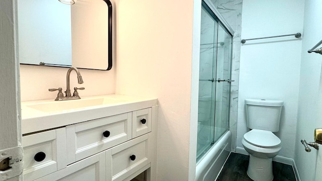 9005 Gaylord St Unit 20, Houston, TX 77024 - full bathroom featuring vanity and bath / shower combo with glass door
