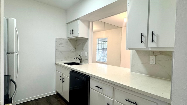 9005 Gaylord St Unit 20, Houston, TX 77024 - kitchen featuring dishwasher, backsplash, freestanding refrigerator, white cabinets, and dark wood finished floors