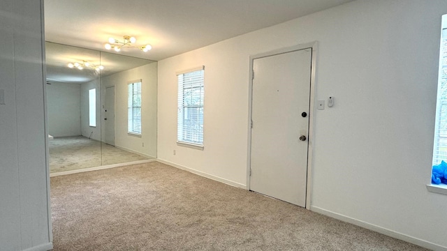9005 Gaylord St Unit 20, Houston, TX 77024 - entryway with carpet floors