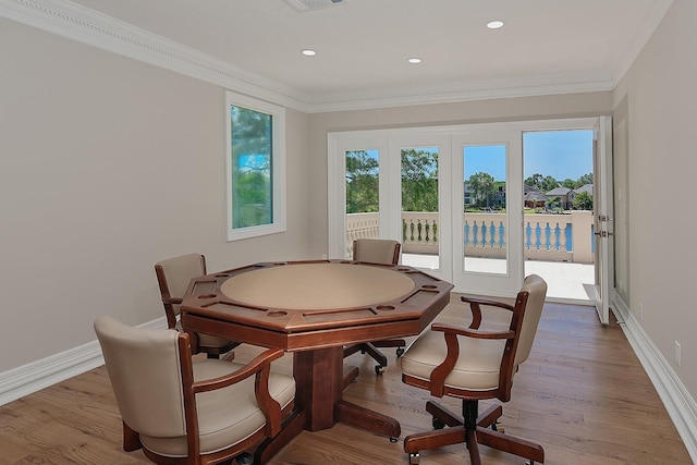 rec room featuring ornamental molding, baseboards, wood finished floors, and recessed lighting