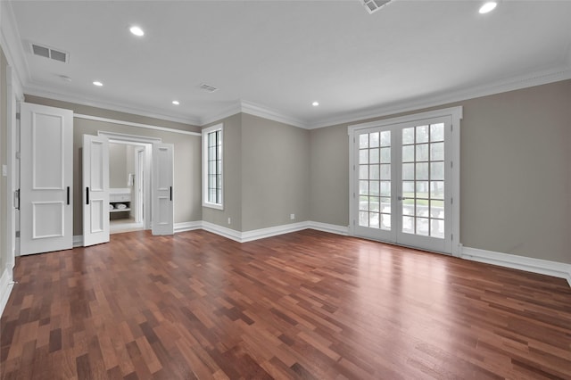 unfurnished room with plenty of natural light, french doors, baseboards, dark wood-type flooring, and recessed lighting