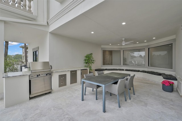dining room with a ceiling fan and recessed lighting