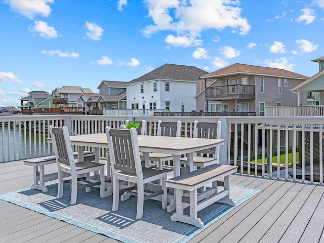 441 Jeanie Lynn St, Galveston, TX 77554 - wooden terrace with a residential view and outdoor dining area
