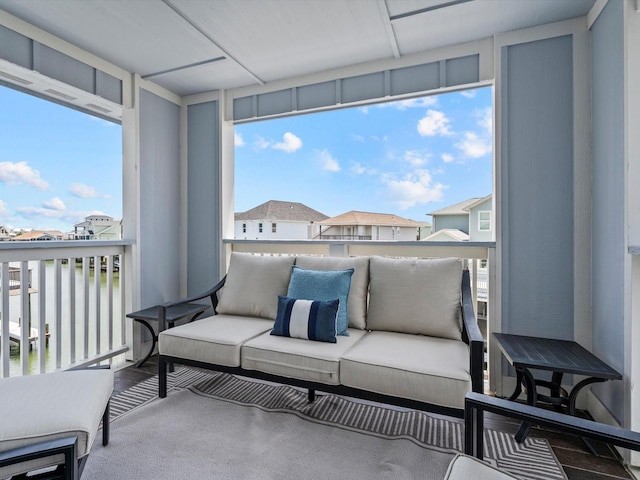 441 Jeanie Lynn St, Galveston, TX 77554 - sunroom / solarium featuring plenty of natural light and a residential view