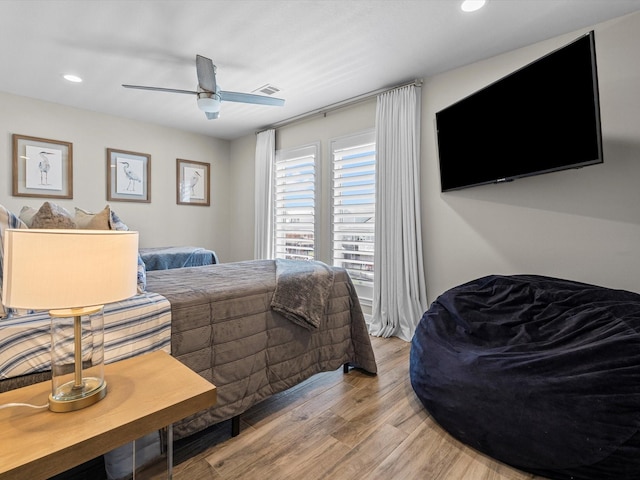 441 Jeanie Lynn St, Galveston, TX 77554 - bedroom with light wood finished floors, recessed lighting, and a ceiling fan