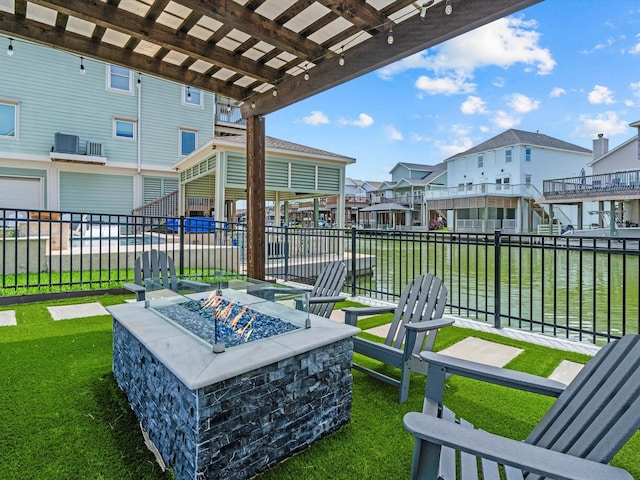 441 Jeanie Lynn St, Galveston, TX 77554 - view of yard with a fire pit and a residential view