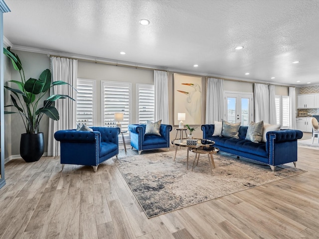 441 Jeanie Lynn St, Galveston, TX 77554 - living area with a textured ceiling, wood finished floors, recessed lighting, and crown molding