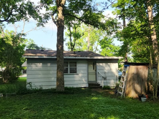 3406 N Winfree, Dayton, TX 77535 - back of property with entry steps and a lawn