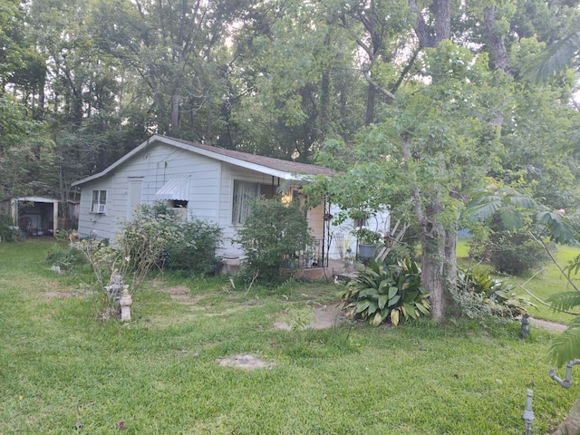 3406 N Winfree, Dayton, TX 77535 - view of home's exterior with a yard