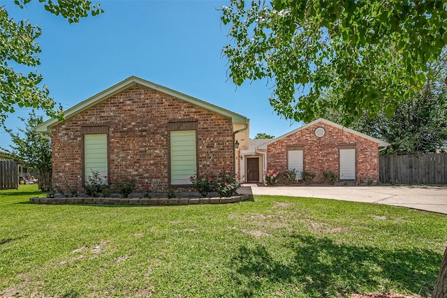 12703 Fenimore Ct, Sugar Land, TX 77478 - view of front facade featuring brick siding and concrete driveway