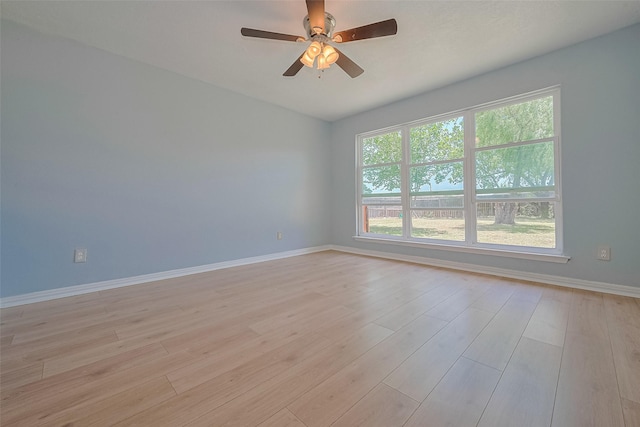 12703 Fenimore Ct, Sugar Land, TX 77478 - empty room featuring baseboards, light wood-type flooring, and ceiling fan