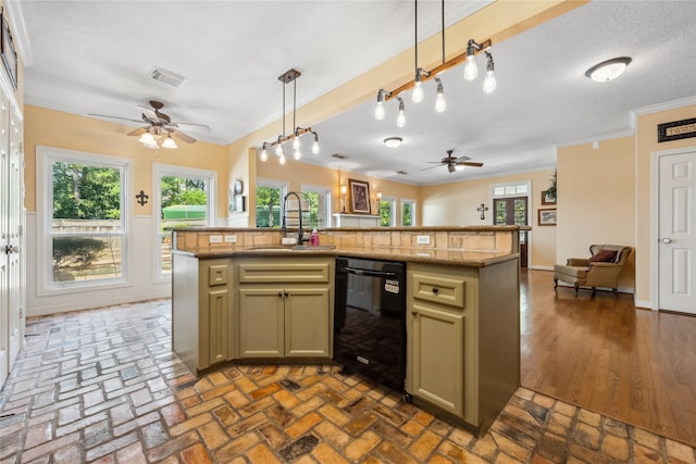 30011 Commons Forest Ct, Huffman, TX 77336 - kitchen with dishwasher, ceiling fan, a sink, ornamental molding, and open floor plan