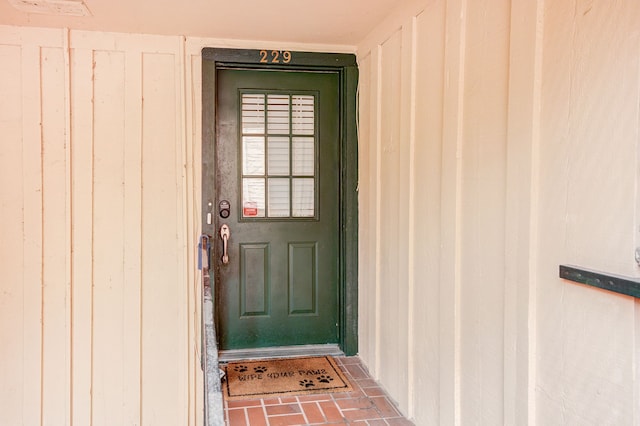 8229 Kingsbrook Rd Unit 229, Houston, TX 77024 - view of exterior entry featuring board and batten siding