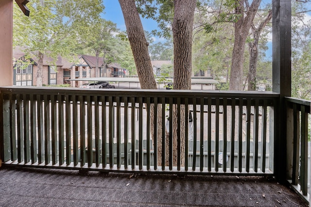 8229 Kingsbrook Rd Unit 229, Houston, TX 77024 - wooden terrace with a residential view