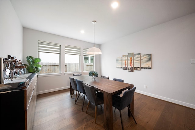 1682 Sherwood Glen Dr, Friendswood, TX 77546 - dining space featuring baseboards, dark wood-type flooring, and recessed lighting