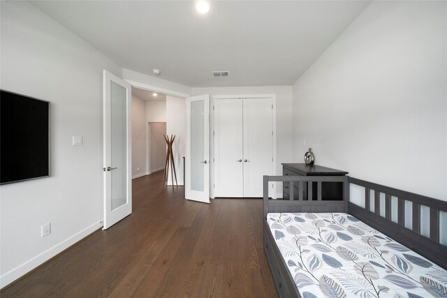 1682 Sherwood Glen Dr, Friendswood, TX 77546 - bedroom featuring dark wood-style floors, baseboards, french doors, a closet, and recessed lighting