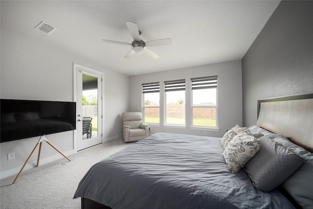 1682 Sherwood Glen Dr, Friendswood, TX 77546 - carpeted bedroom with access to outside, baseboards, and a ceiling fan