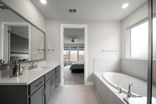 1682 Sherwood Glen Dr, Friendswood, TX 77546 - full bath featuring ensuite bath, vanity, a bath, a ceiling fan, and recessed lighting