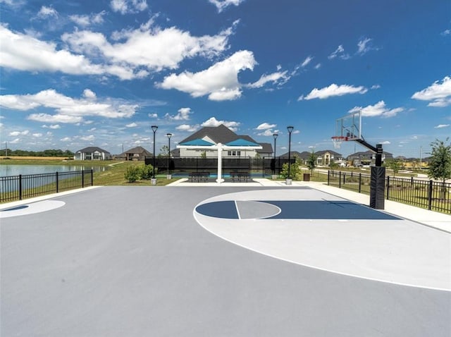1682 Sherwood Glen Dr, Friendswood, TX 77546 - view of basketball court featuring community basketball court and a water view