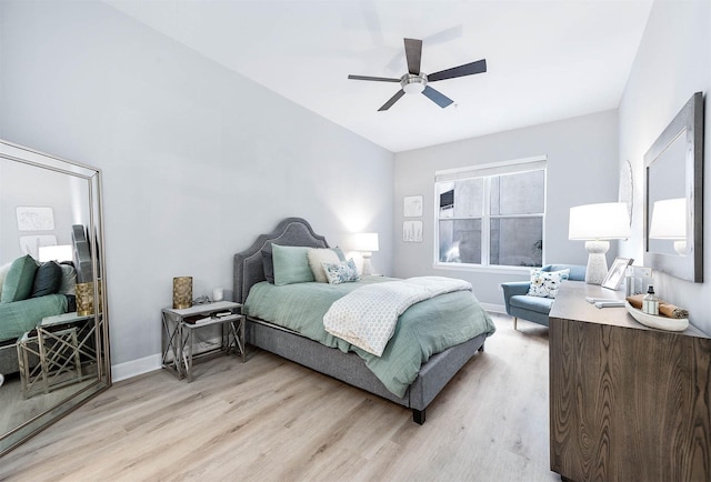 300 St Joseph Pkwy Unit 121, Houston, TX 77002 - bedroom with light wood finished floors, baseboards, and ceiling fan