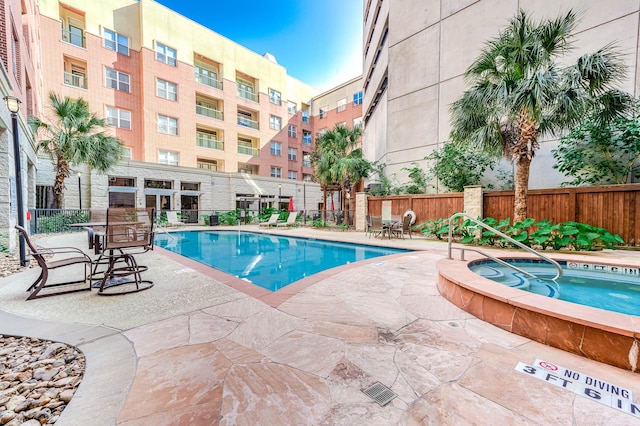 300 St Joseph Pkwy Unit 121, Houston, TX 77002 - community pool with fence and a patio