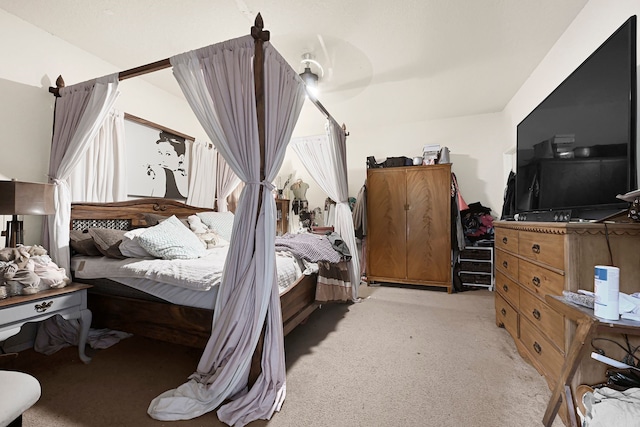 bedroom with light colored carpet