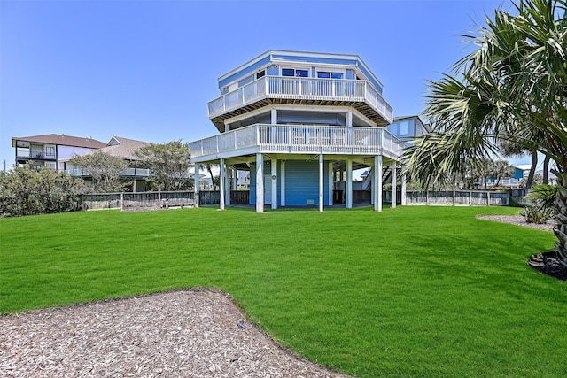 rear view of property with a deck and stairway