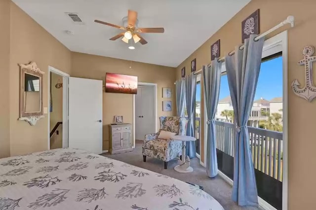 carpeted bedroom featuring access to exterior