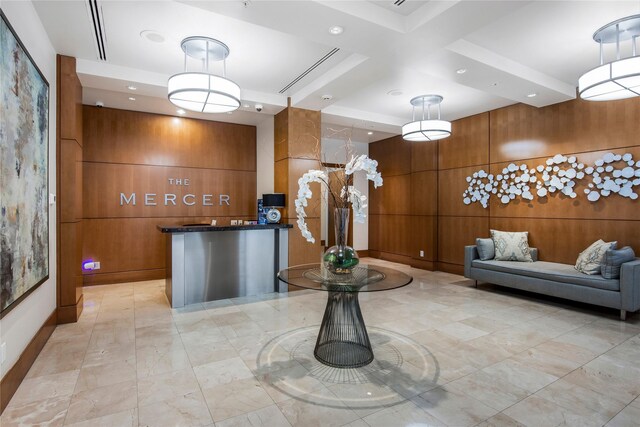 3388 Sage Rd Unit 1702, Houston, TX 77056 - reception area with recessed lighting, wood walls, and coffered ceiling