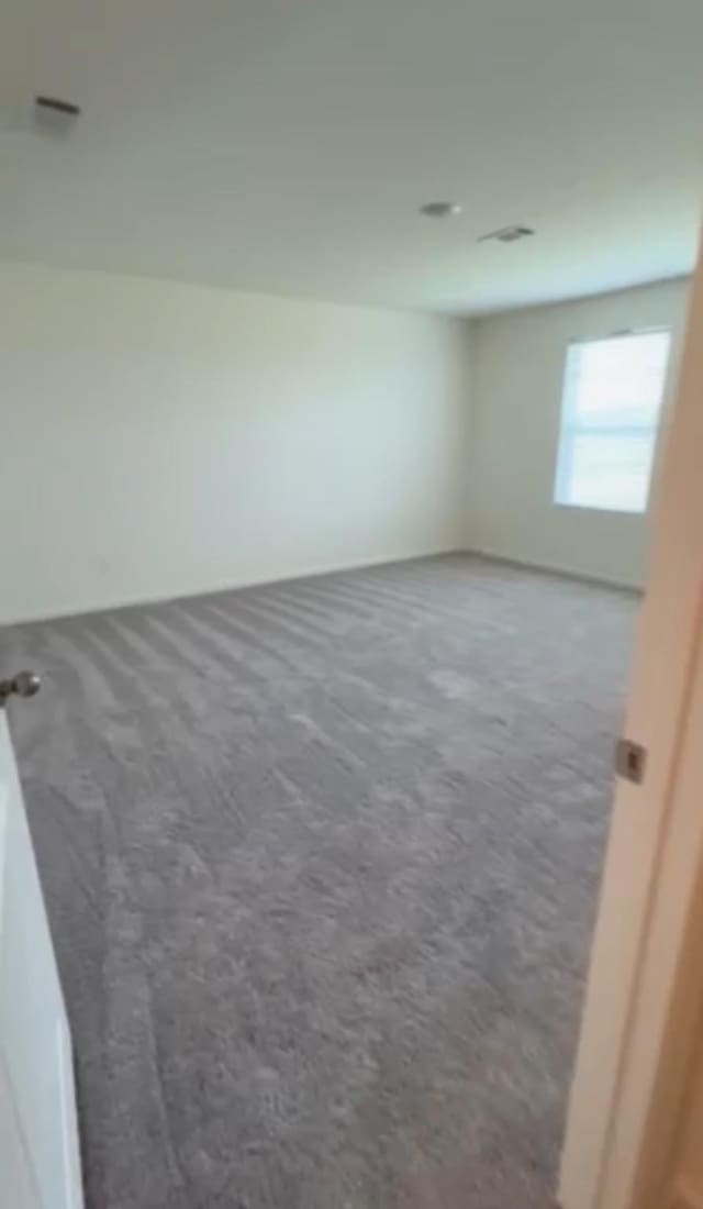 21596 Rolling Streams Dr, New Caney, TX 77357 - spare room with carpet
