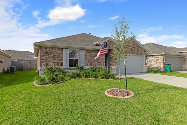 21623 Oakwood Meadows Ln, Katy, TX 77449 - view of front of house with brick siding, driveway, an attached garage, a shingled roof, and central AC unit