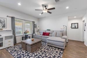 21623 Oakwood Meadows Ln, Katy, TX 77449 - living room featuring a ceiling fan, wood finished floors, and recessed lighting