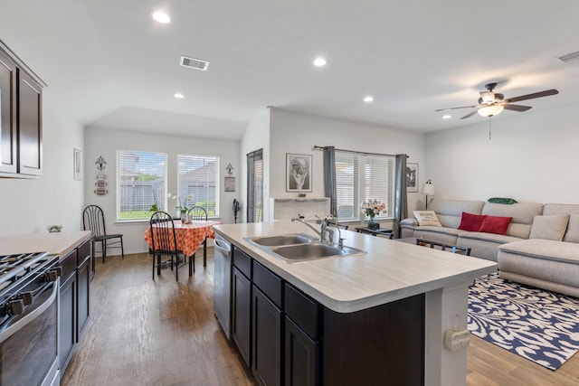 21623 Oakwood Meadows Ln, Katy, TX 77449 - kitchen featuring appliances with stainless steel finishes, a sink, light countertops, ceiling fan, and wood finished floors