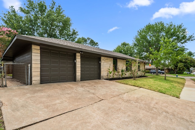 2114 Lazybrook Dr, Houston, TX 77008 - view of front facade with concrete driveway, a front lawn, an attached garage, stone siding, and roof with shingles