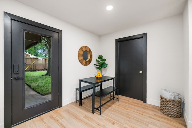 2114 Lazybrook Dr, Houston, TX 77008 - foyer entrance with light wood-style floors, baseboards, and recessed lighting