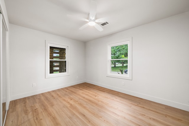 2114 Lazybrook Dr, Houston, TX 77008 - spare room with baseboards, light wood-type flooring, and ceiling fan