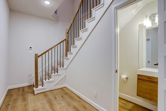 813 Nelson St, Sealy, TX 77474 - staircase featuring wood finished floors and baseboards