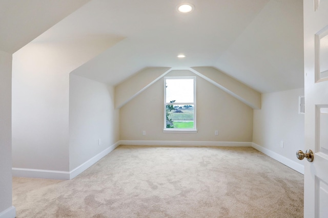 813 Nelson St, Sealy, TX 77474 - bonus room featuring carpet floors, recessed lighting, vaulted ceiling, and baseboards
