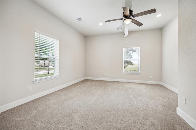 813 Nelson St, Sealy, TX 77474 - spare room with light colored carpet, ceiling fan, baseboards, and recessed lighting