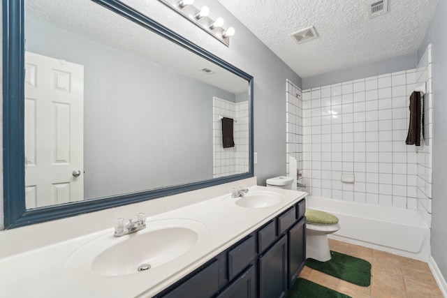 3339 Legends Creek Dr, Spring, TX 77386 - bathroom featuring toilet, double vanity, tile patterned flooring, and shower / bath combination