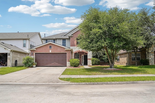 3339 Legends Creek Dr, Spring, TX 77386 - view of front of home featuring a garage, brick siding, a front yard, driveway, and stone siding