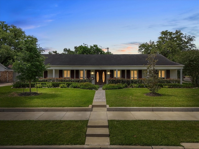 7723 Meadowbriar Ln, Houston, TX 77063 - ranch-style house with a yard
