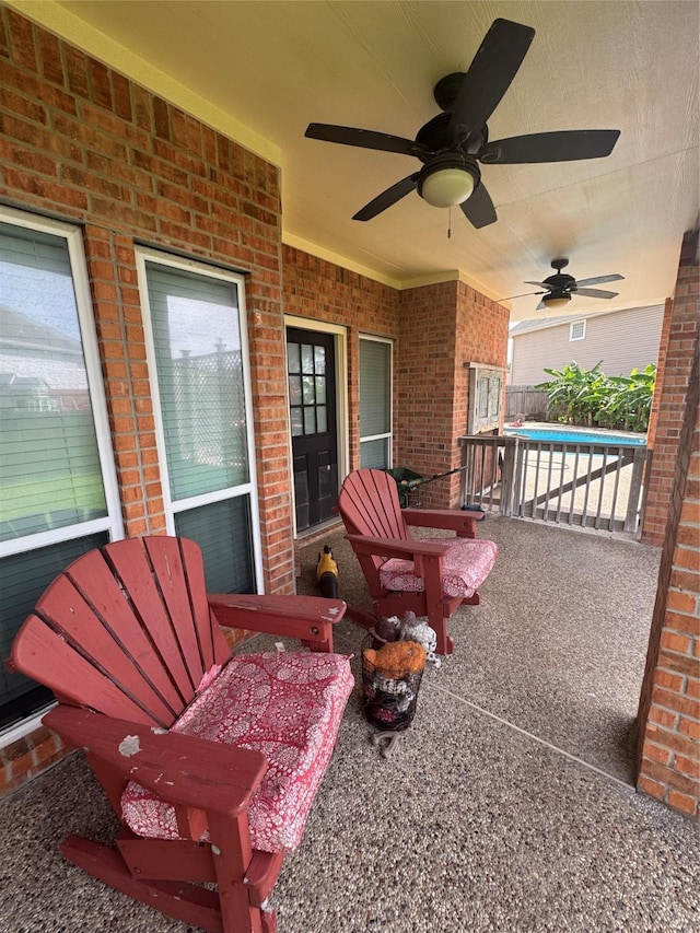 12811 E Conquistador Dr, Galveston, TX 77554 - view of patio / terrace featuring a ceiling fan