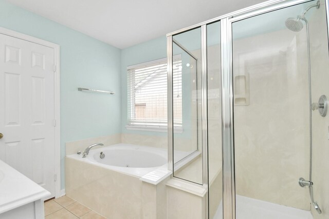 6007 Indian Crk, Missouri City, TX 77459 - bathroom with a shower stall, tile patterned flooring, and a bath