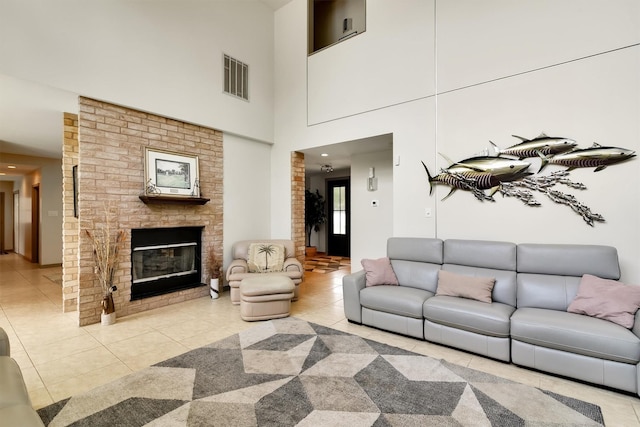 19727 Country Lake Dr, Magnolia, TX 77355 - tiled living room with a fireplace
